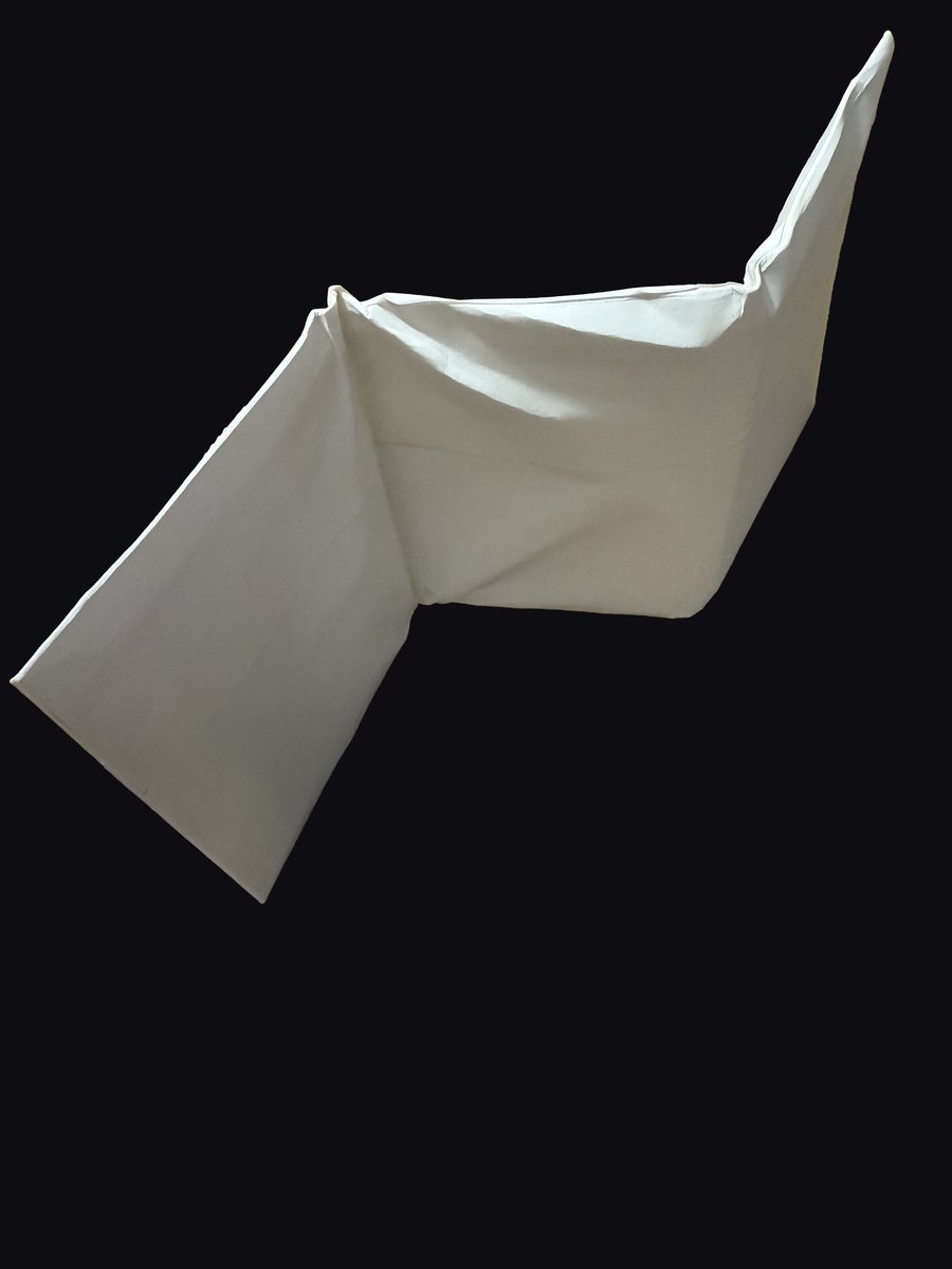 Trading card shipping envelope flexed sharply during the USPS machinability flex test